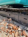 2002 Kobelco SK60 crawler excavator undercarriage view