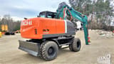 2012 Hitachi Zaxis 140W wheel excavator, rear three-quarter view