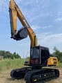 2000 Sany SY215C crawler excavator, side profile view