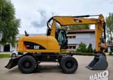 2012 CAT M313D wheel excavator side view