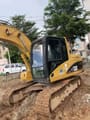 2023 Caterpillar 312C crawler excavator, side view