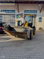 2011 JCB 409 wheel loader, front three-quarter view