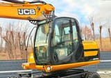 2011 JCB JS145W wheel excavator cab and boom view