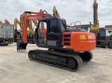 2021 Hitachi ZX120 crawler excavator, rear three-quarter view