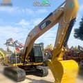 2017 Caterpillar 320D2 paletli ekskavatör, yan görünüm