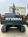 2026 Hyundai HX340HD Crawler Excavator showing the rear counterweight with the Hyundai logo.