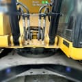 2022 Caterpillar 320GC crawler excavator boom hydraulic connection detail