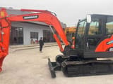 2024 Doosan DX60-9C excavator, side profile view