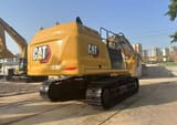 2022 Caterpillar 349 crawler excavator, rear three-quarter view