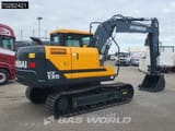 2025 Hyundai HX130 N Crawler Excavator with its black tracks and undercarriage clearly visible.