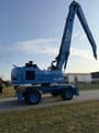 2000 Terex Fuchs MHL360 material handler, side profile view