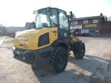 2023 New Holland W80C mini excavator, rear three-quarter view