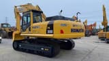 Komatsu PC300 crawler excavator, rear three-quarter view
