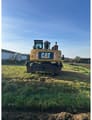 2009 Caterpillar M322D wheel excavator, rear view