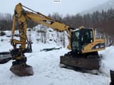 2005 Caterpillar M313C wheel excavator, side profile view