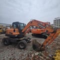 2018 Doosan DX60W wheel excavator, side view