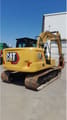 2021 Caterpillar 313-07GC crawler excavator, rear three-quarter view