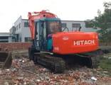 2018 Hitachi EX120-3 crawler excavator, rear three-quarter view