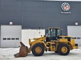 2003 Caterpillar 938G wheel loader, side profile view