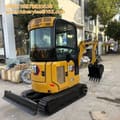 2025 Caterpillar 302 mini excavator, front three-quarter view