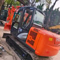 2024 Hitachi ZX60 mini excavator, rear three-quarter view