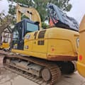 2024 Caterpillar 320GX crawler excavator, rear three-quarter view