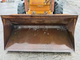 1995 CASE 1825 skid steer loader front bucket view