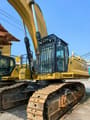 2022 Caterpillar 395 crawler excavator, side view