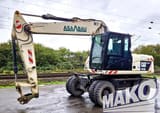2012 CAT M316D wheel excavator, side view