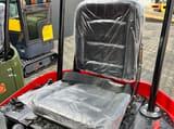 2025 Captok CK13 Mini Excavator with a close-up of the black operator's seat and safety belt.