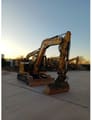 2023 Caterpillar 308 crawler excavator, front three-quarter view