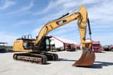 2014 Caterpillar 329E crawler excavator, side profile view