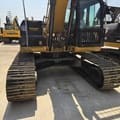 2023 Caterpillar 323DL crawler excavator, front view