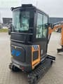 2024 CASE CX 25 EV mini excavator, rear three-quarter view