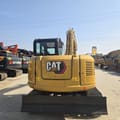 2023 Caterpillar 308E2 mini excavator, rear view
