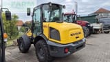 2020 New Holland W60 C mini excavator, rear three-quarter view
