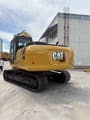 Caterpillar 320GC crawler excavator, rear three-quarter view