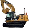 Widok z boku koparki gąsienicowej Caterpillar 320DL z 2016 roku