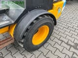 2023 JCB 403 E AGRI mini excavator wheel and fender detail