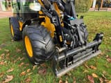 2023 JCB 403 E AGRI front view of loader attachment