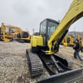 2024 Yanmar VIO35 mini excavator, rear three-quarter view