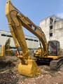 2008 Caterpillar 320BL crawler excavator, front three-quarter view