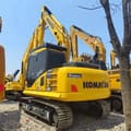 Komatsu PC130 crawler excavator, rear three-quarter view