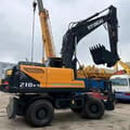 Hyundai 210W-9T wheel excavator, side view