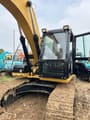 Caterpillar 315D2GC crawler excavator cab and boom view