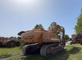 2000 CASE 9046 crawler excavator, rear three-quarter view