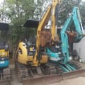 2023 Caterpillar 302C mini excavator, front three-quarter view