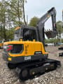 2024 Volvo EC60D mini excavator, rear three-quarter view