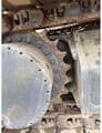 2007 Kobelco SK480 excavator track drive sprocket detail
