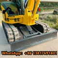 2023 Komatsu PC55 mini excavator front view with blade